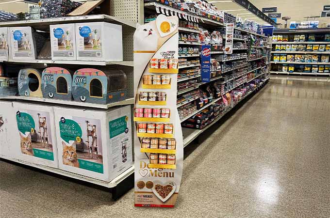 Discover how Purina Fancy Feast launched with a sustainable, luxurious retail display, captivating gourmet cat food shoppers and setting a new standard.