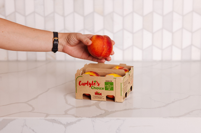 Learn how we teamed up with U.S. peach growers Titan Farms to create recyclable, fiber-based produce packaging.